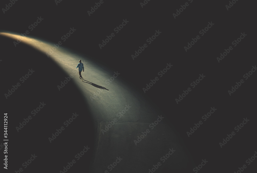 man walking in the night